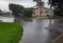 Dormant rainwater leaves road flooded