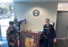 Sewing group hand-crafts blankets for victims of crime