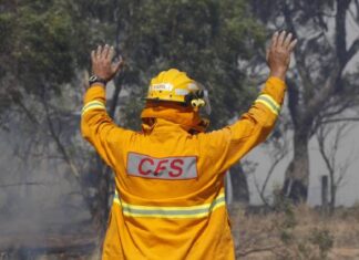 Fire burns through grass, hay bales near Inman Valley